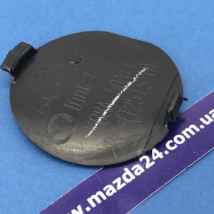 KB8A50A11BBB - Заглушка буксировочного крюка переднего бампера Mazda CX-5 (2017-2021)