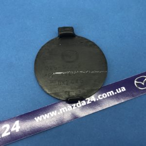 KD4550A12BB - Заглушка буксировочного крюка переднего бампера Mazda CX-5 (2012-2016)