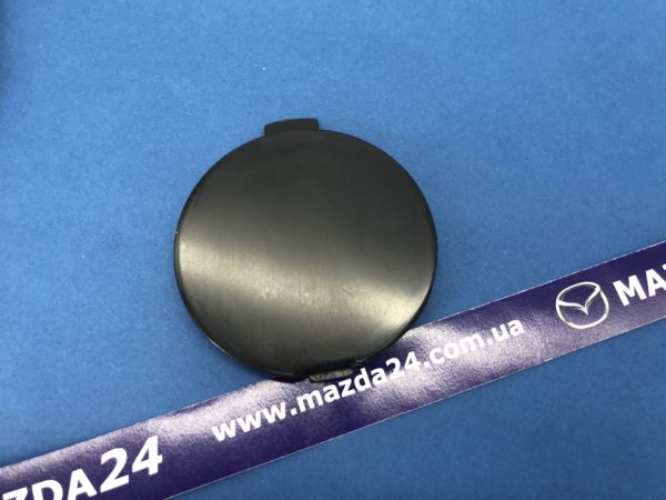 KD4550A12BB - Заглушка буксировочного крюка переднего бампера Mazda CX-5 (2012-2016)