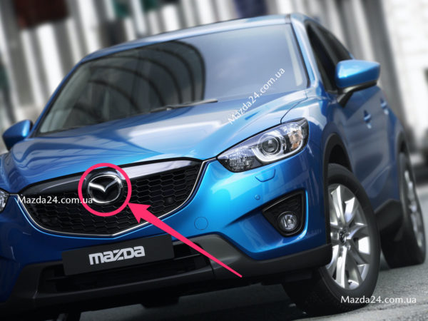KD4551741 - Эмблема решетки радиатора Mazda CX-5, CX-9
